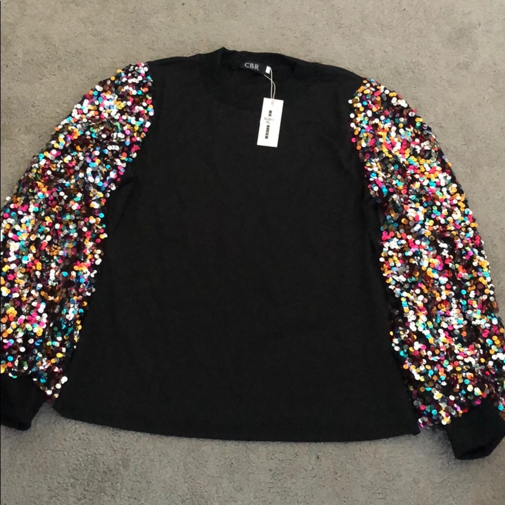 black shirt with glitter sleeves